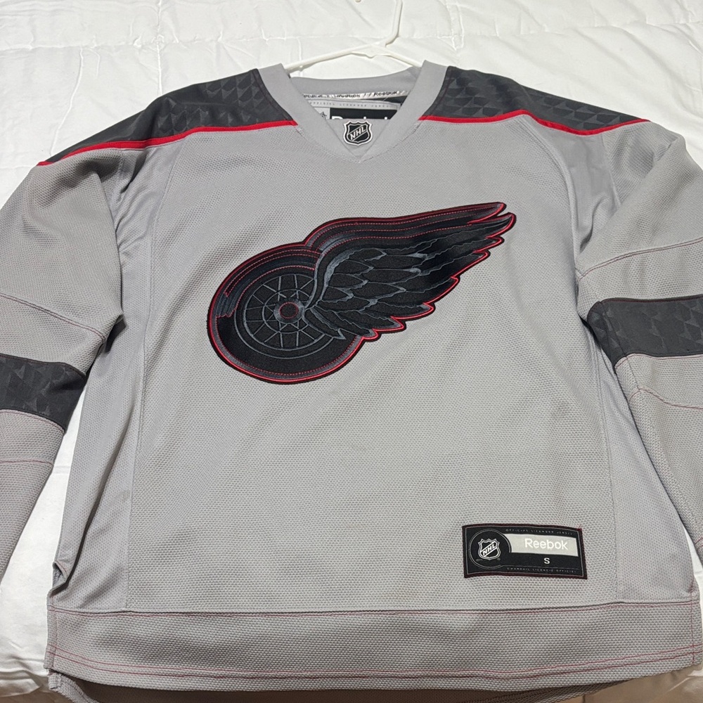Reebok Gray and Black Hockey Jersey with Red Accents